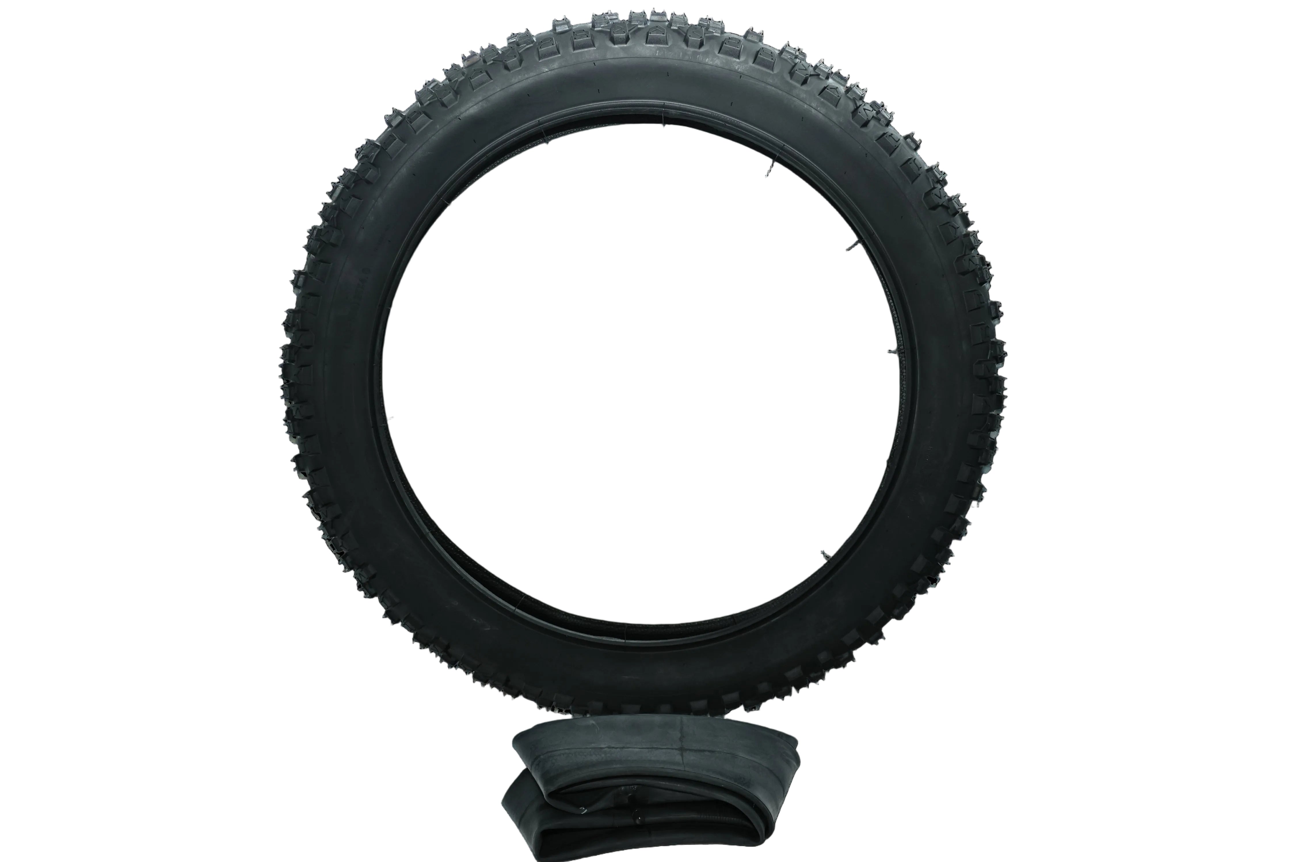A black knobby bicycle tire shown upright against a solid black background, with a folded matching black inner tube resting below it.