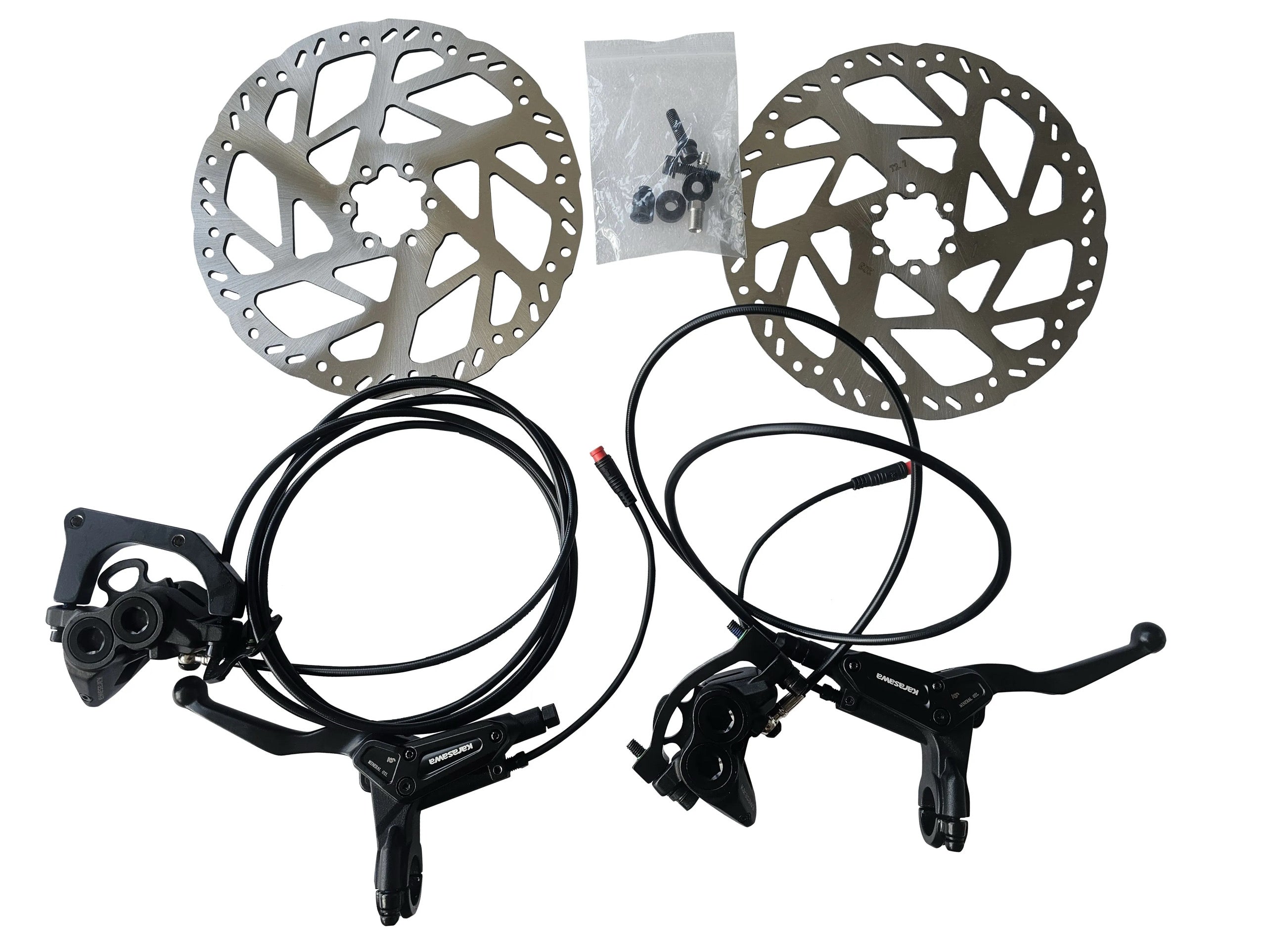 Bicycle disc brakes and rotors on a white background